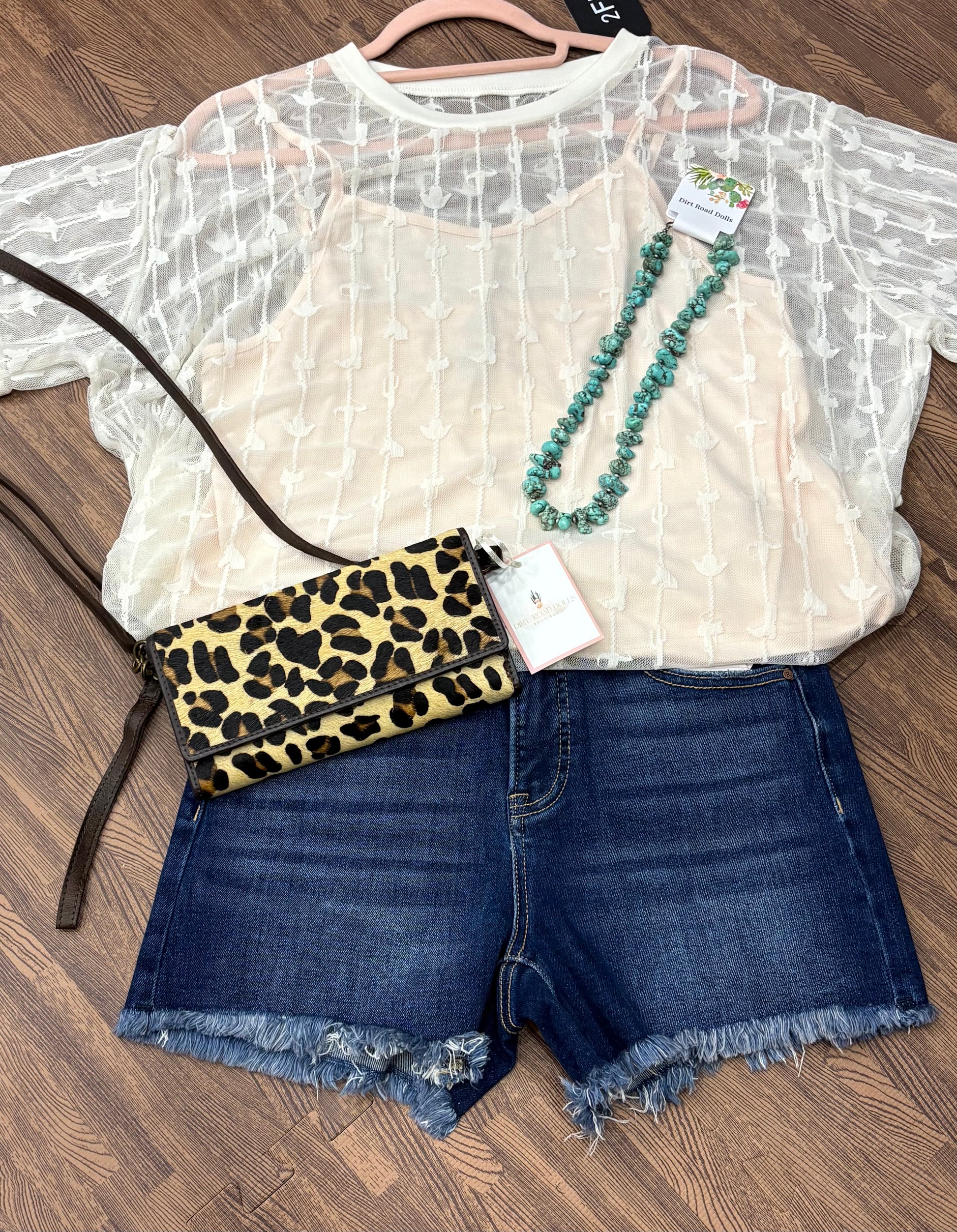 Sweetwater Lace Top with western lace pattern of boots, hats, and saddles – short sleeve round neck blouse with matching cami, relaxed fit.  Shown in white