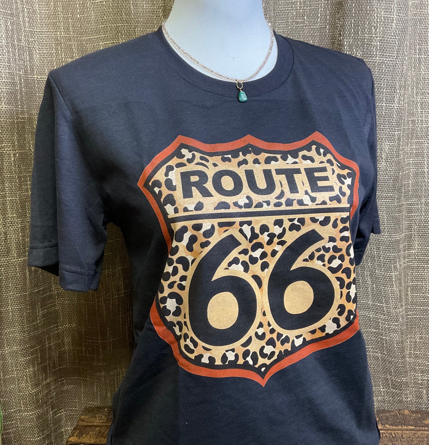Graphite Bella Canvas Route 66 Tee featuring a leopard print Route 66 graphic