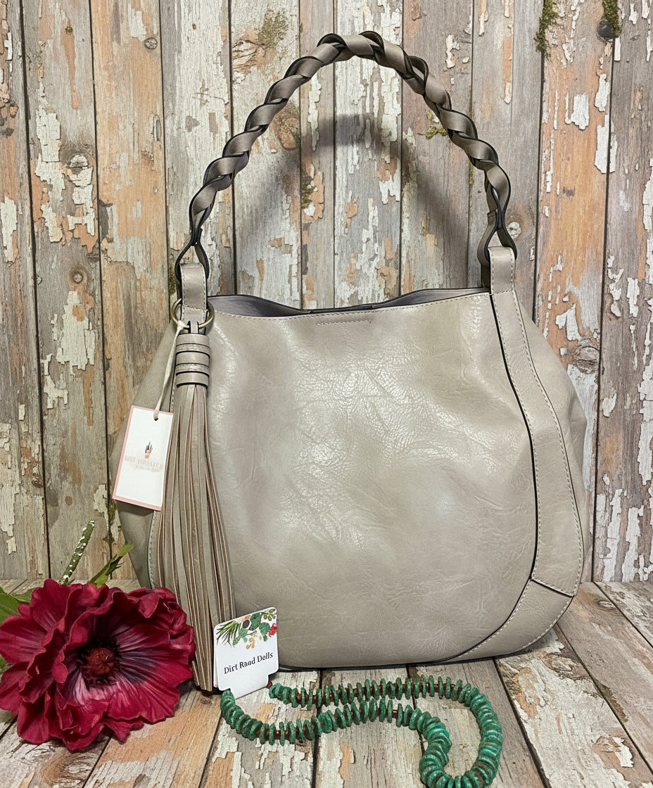 Ellie Hobo Bag in supple vegan leather with large tassel, braided handle, and removable inner crossbody bag – versatile, stylish two-in-one handbag.