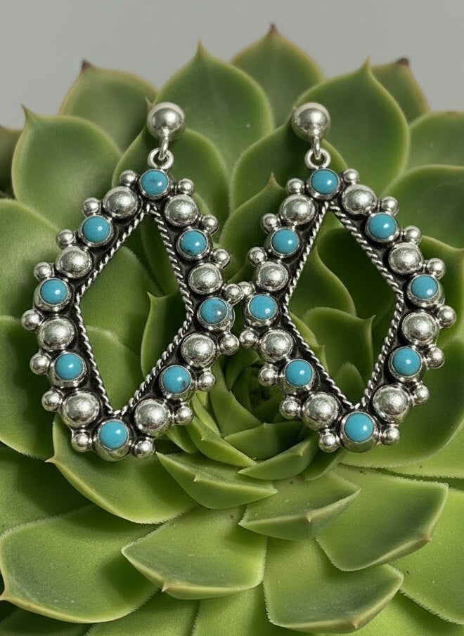Redding Sterling Earrings featuring polished sterling silver with vibrant turquoise stones in a lightweight western-inspired design