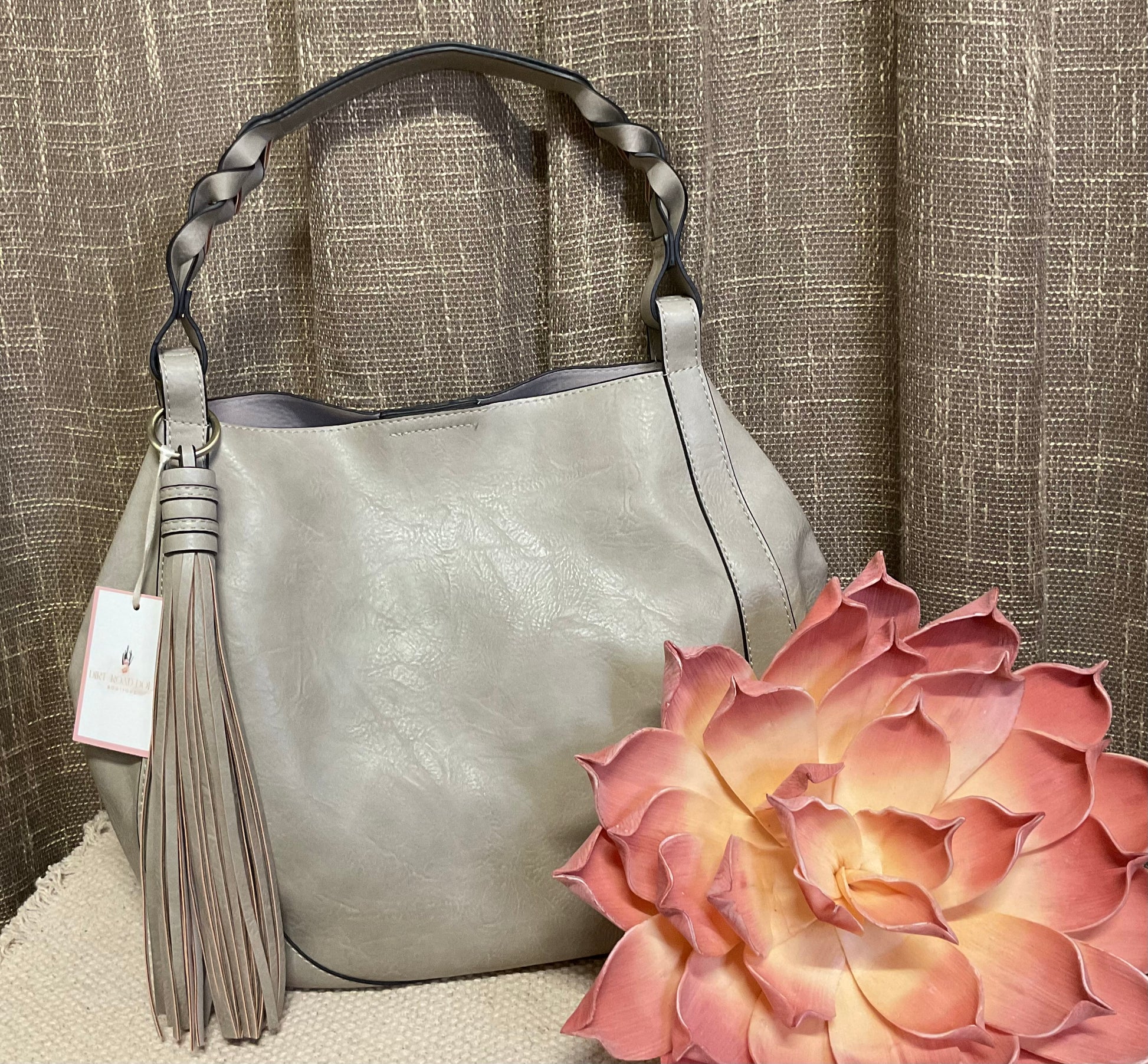 Ellie Hobo Bag in supple vegan leather with large tassel, braided handle, and removable inner crossbody bag – versatile, stylish two-in-one handbag.