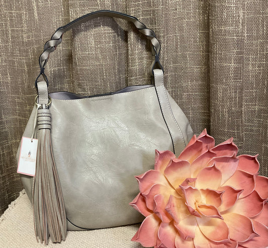 Ellie Hobo Bag in supple vegan leather with large tassel, braided handle, and removable inner crossbody bag – versatile, stylish two-in-one handbag.