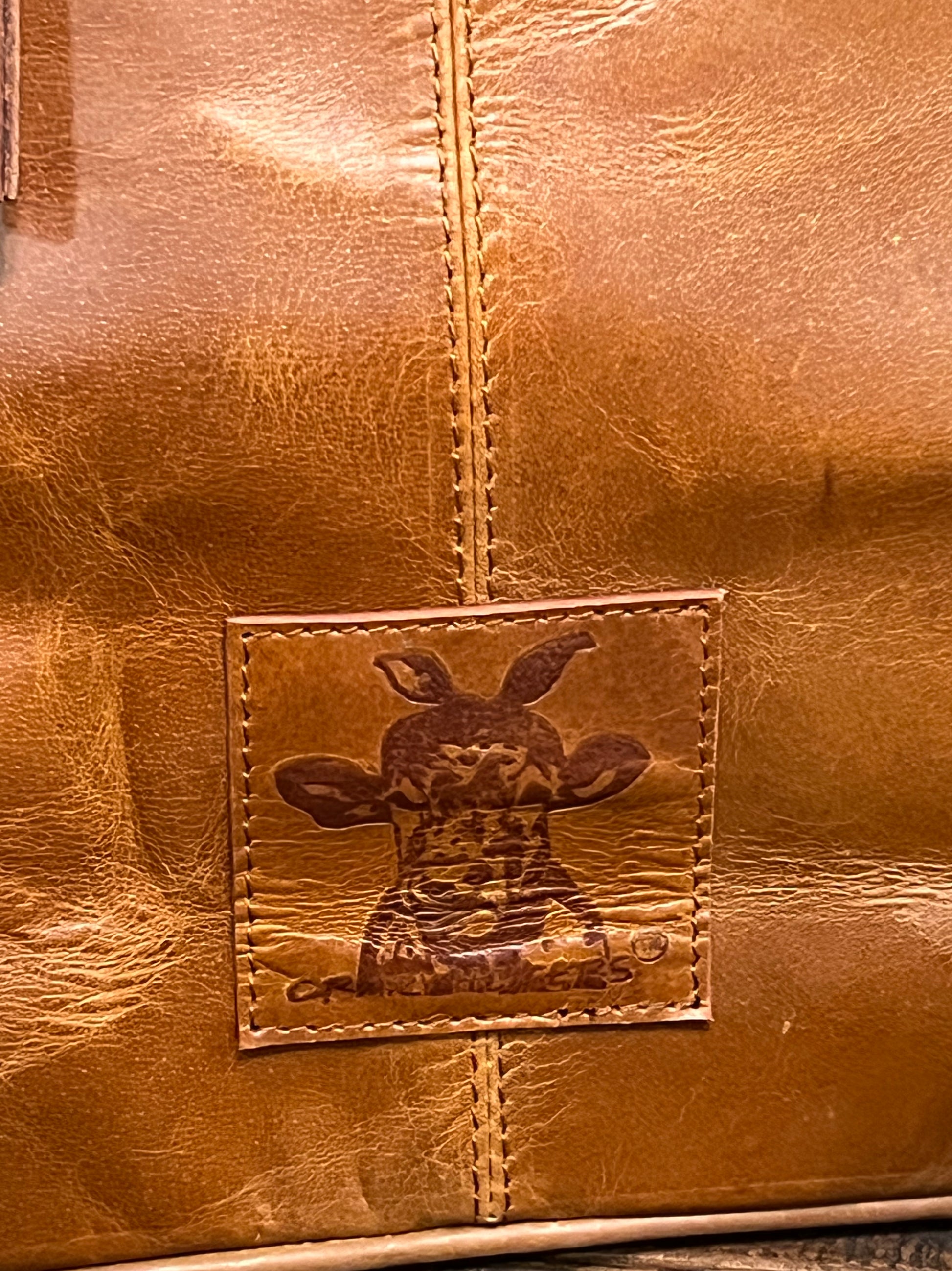 Agua Dulce Tote – handmade leather and cowhide tote with zippered pockets, stamped Crazy Heifers logo, and spacious design for bold western style.