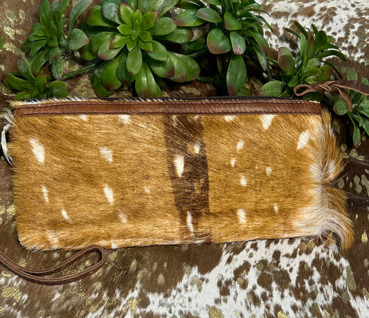 Granbury Wristlet – genuine leather and hair-on hide wristlet with two internal pockets, versatile as a wristlet or clutch for stylish western flair.