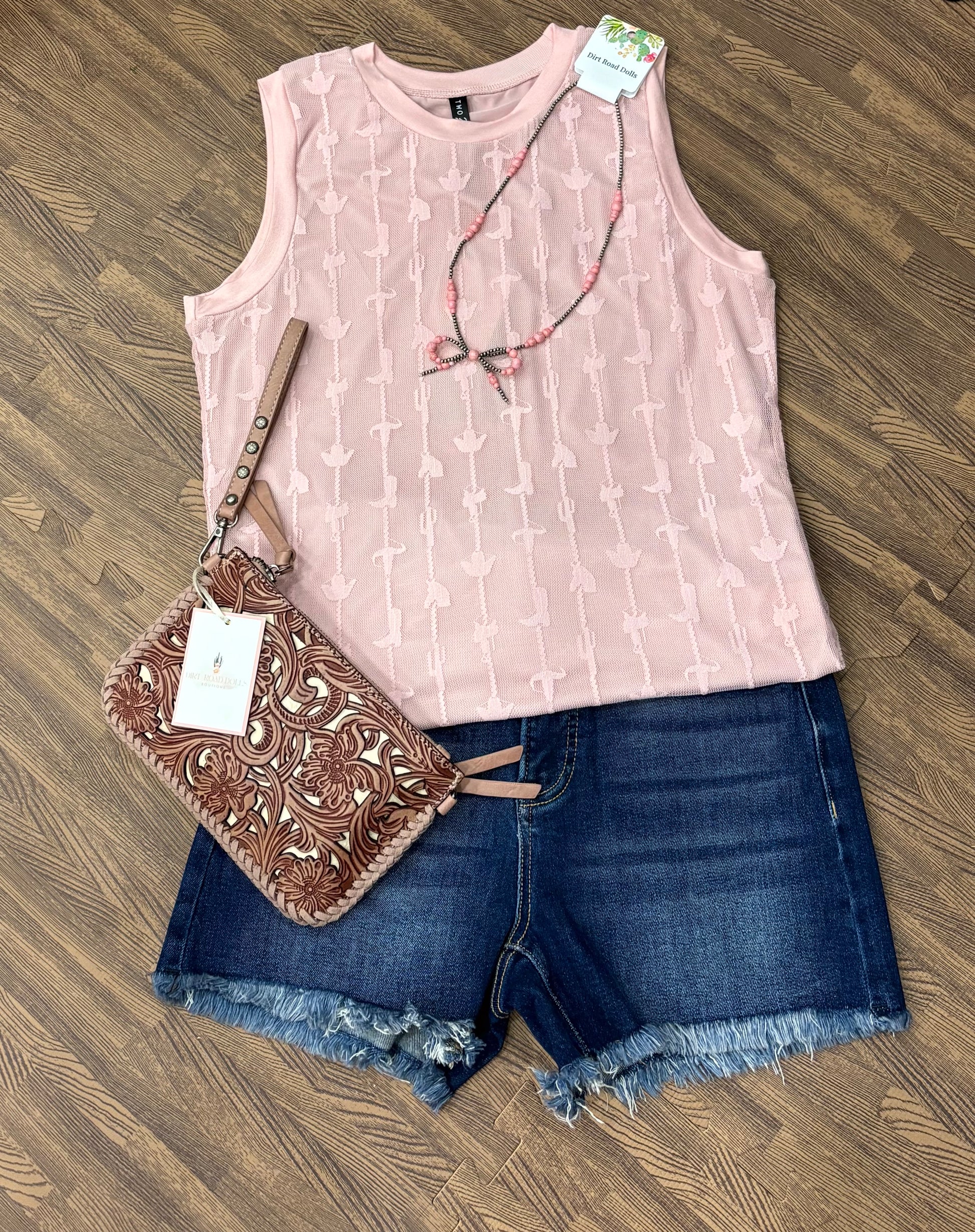 Dusty rose Larkspur Top with woven lace featuring cowgirl boots, hats, and cactus – sleeveless western-inspired lace tank, fully lined and relaxed fit
