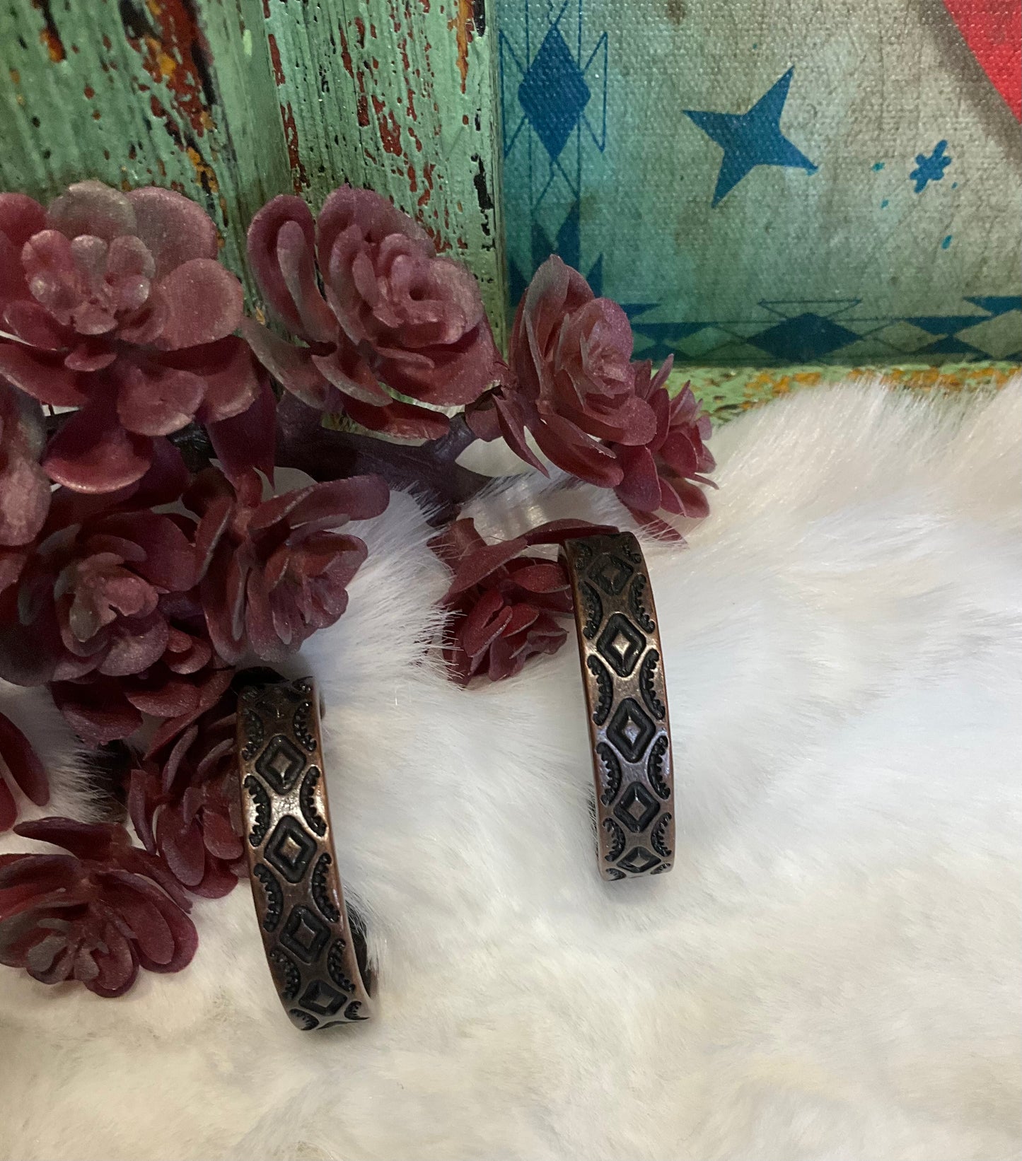 Southwest-inspired Red River Hoop Earrings in faux silver or copper with intricate design, 1.25-inch diameter.