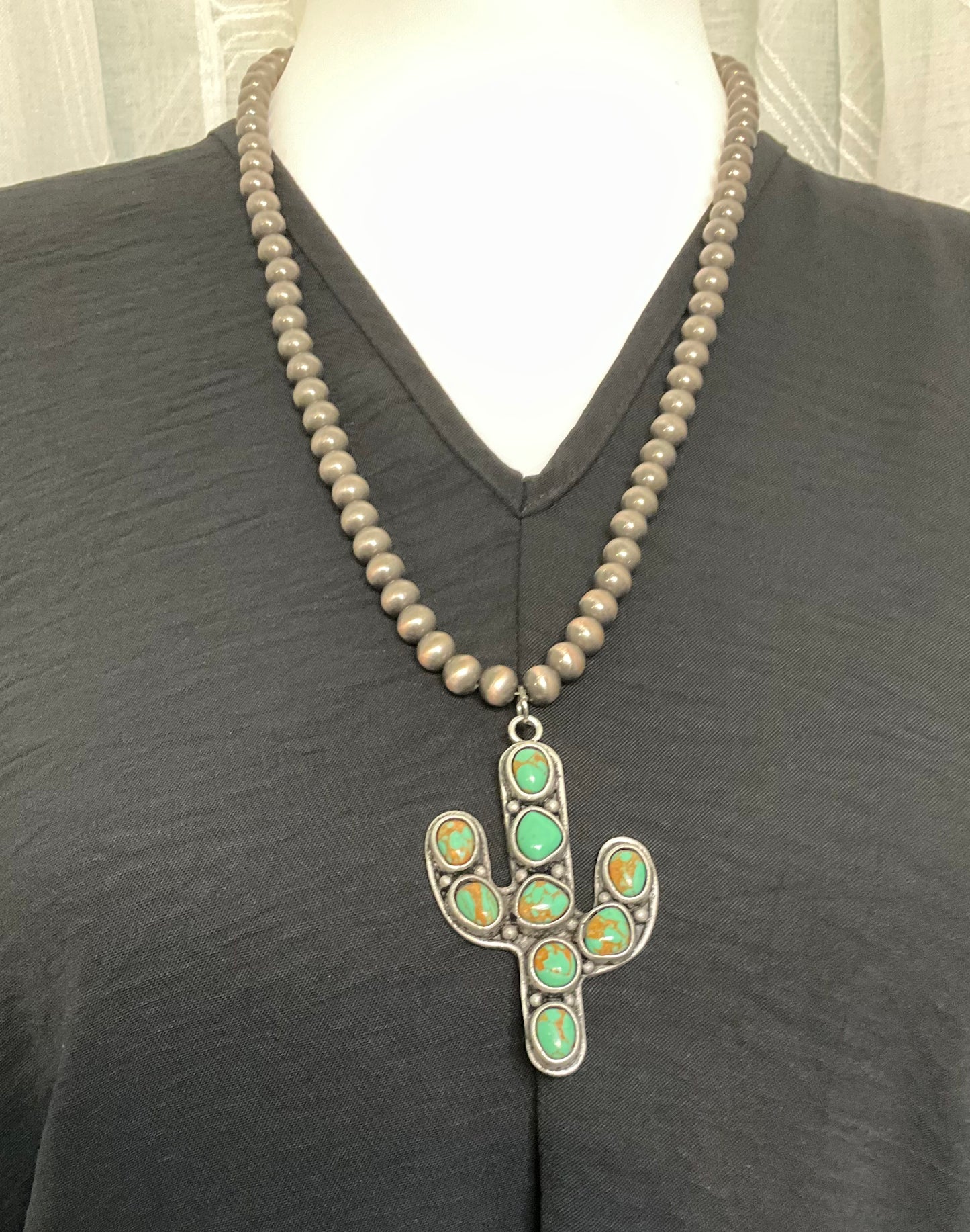 Desert Daze Necklace with faux silver beads featuring a saguaro cactus pendant in faux green turquoise stones – boho western necklace for women