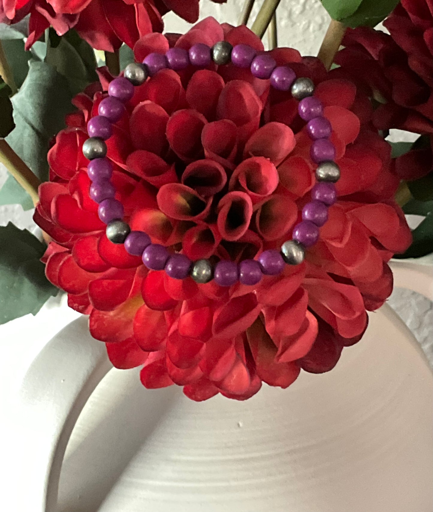 Bold purple beaded stretch bracelet with faux silver pearl accents