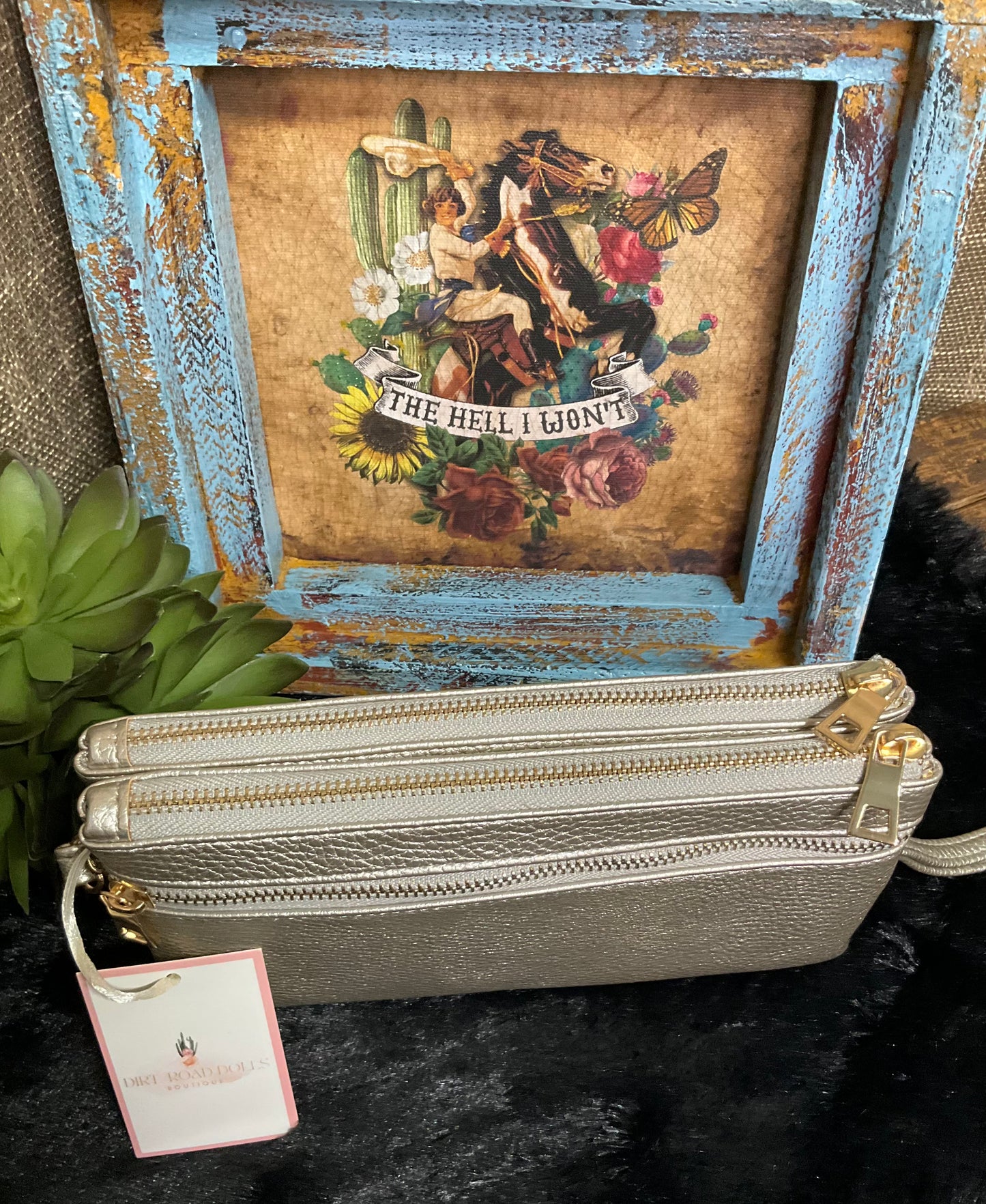 Uptown Convertible Bag in sleek silver textured faux leather with gold-tone fixtures – versatile clutch, wristlet, or crossbody with three compartments and two external zippered pockets.