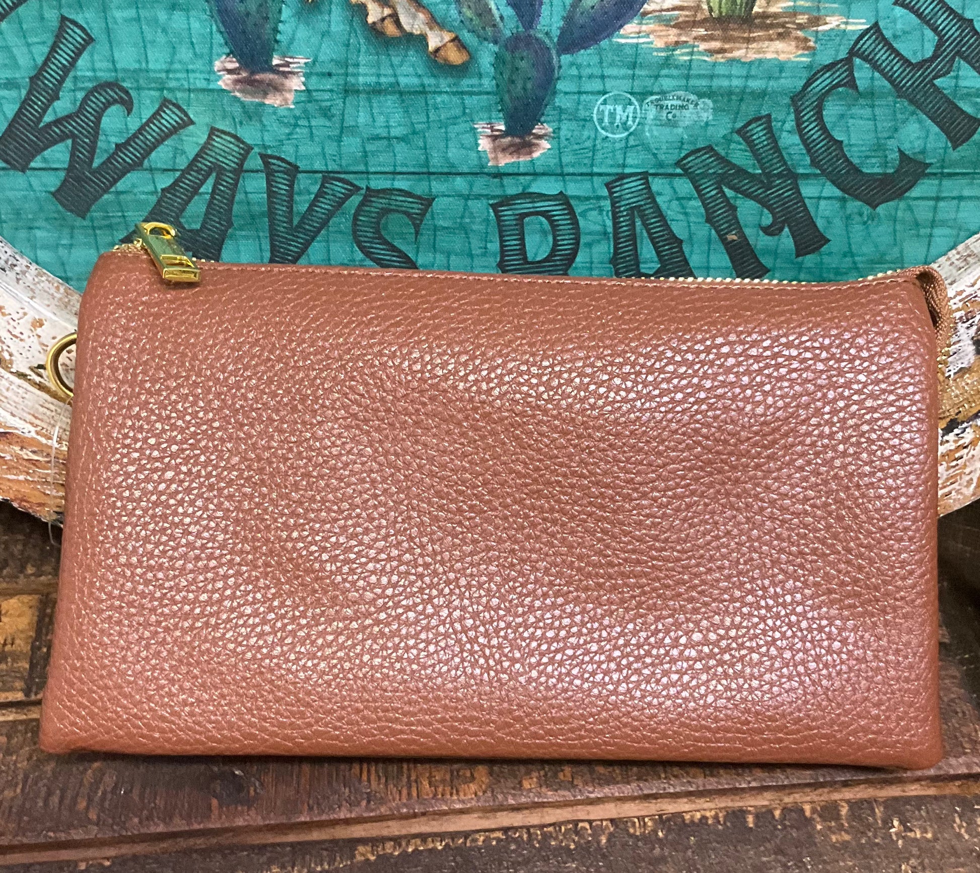 Selma Convertible Bag in textured faux leather with gold-tone fixtures – versatile clutch, wristlet, or crossbody with three zippered compartments and two card slots for organized day-to-night style.