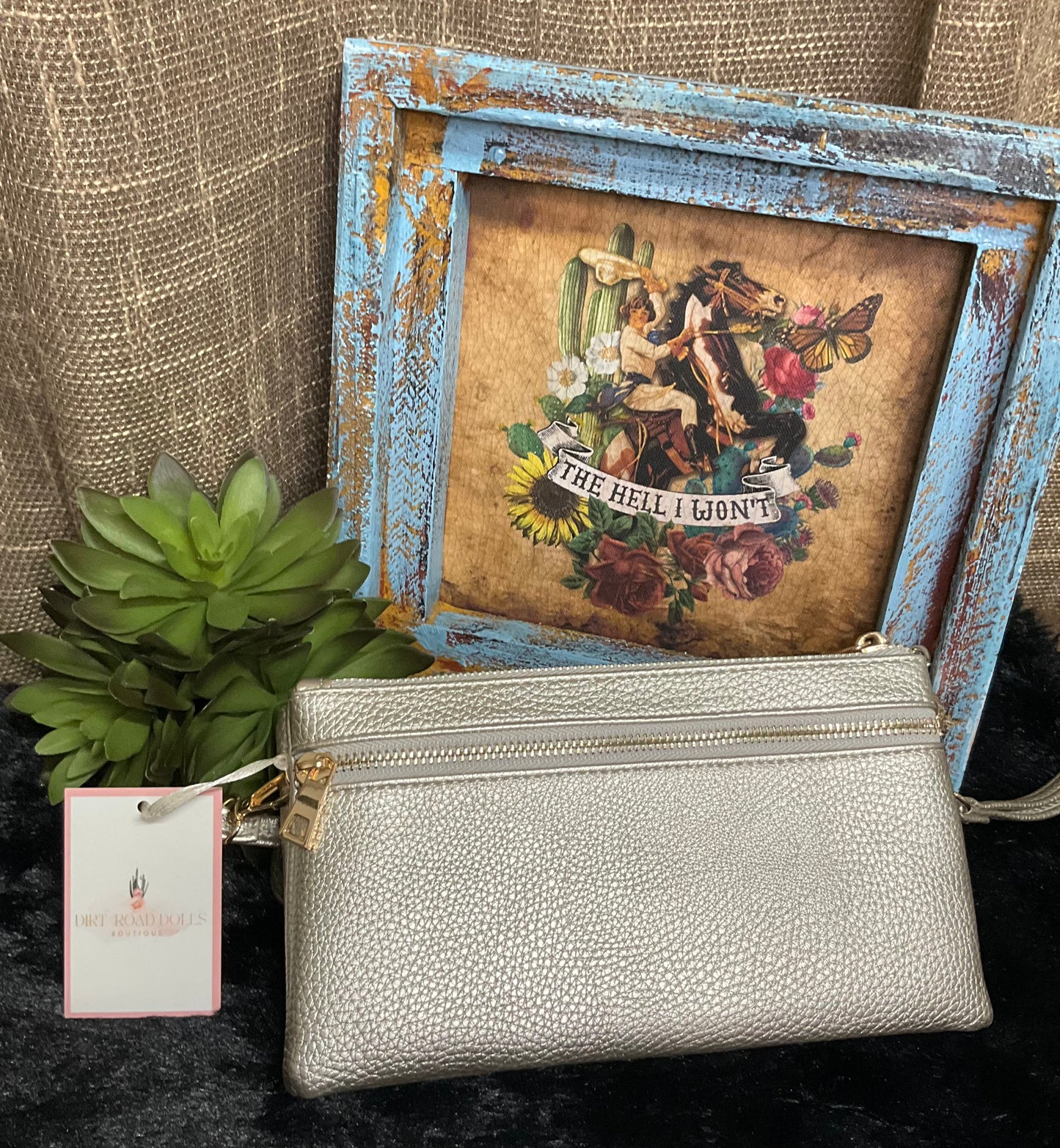 Uptown Convertible Bag in sleek silver textured faux leather with gold-tone fixtures – versatile clutch, wristlet, or crossbody with three compartments and two external zippered pockets.