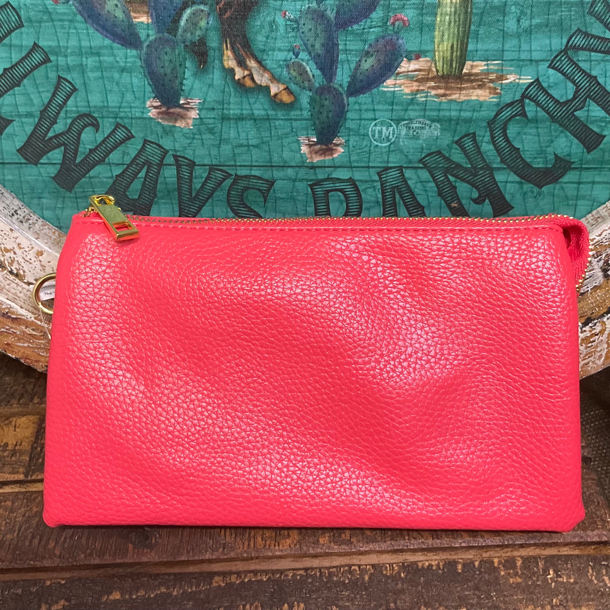 Selma Convertible Bag in textured faux leather with gold-tone fixtures – versatile clutch, wristlet, or crossbody with three zippered compartments and two card slots for organized day-to-night style.