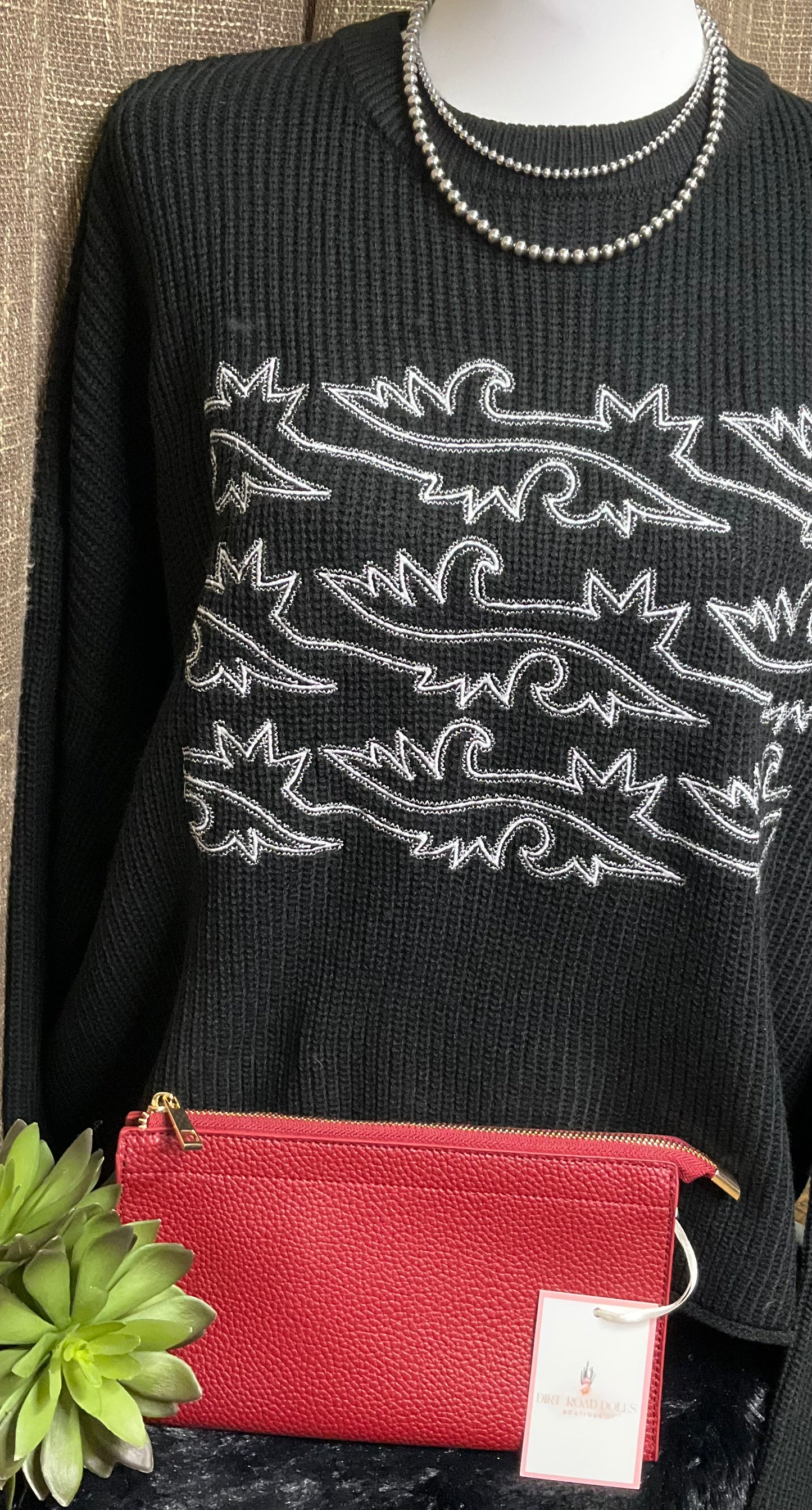 Balcones Heights Convertible Bag in soft pebbled faux leather with zippered closure and five compartments – versatile clutch, wristlet, or crossbody for organized everyday style.