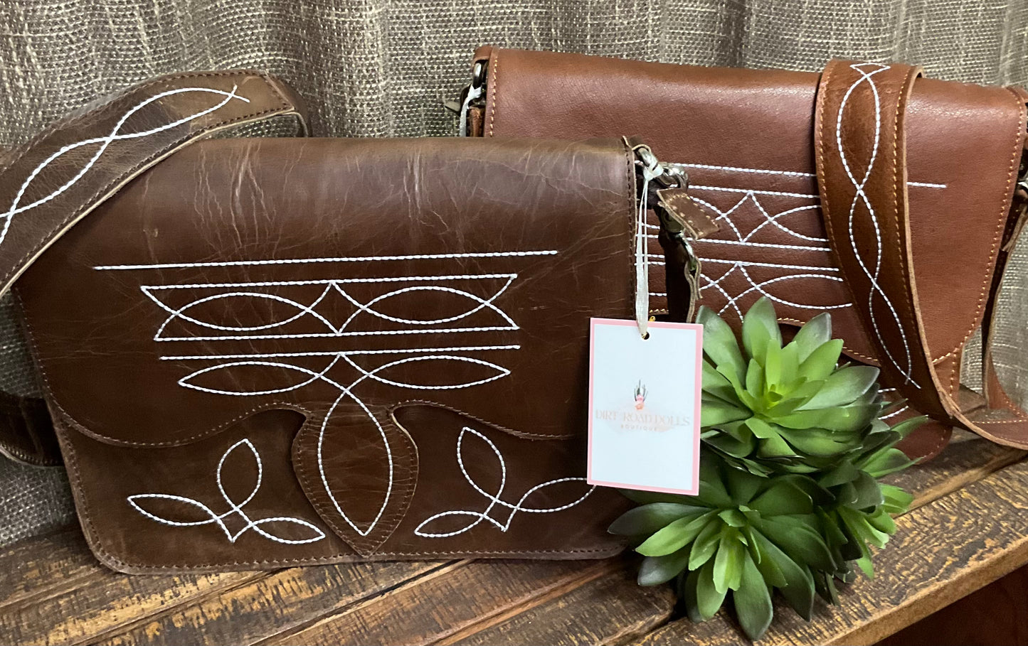 Texarkana Boot Stitch Crossbody in genuine leather with intricate boot stitch embroidery on front, back, and strap – classic western-style crossbody bag with snap flap closure.
