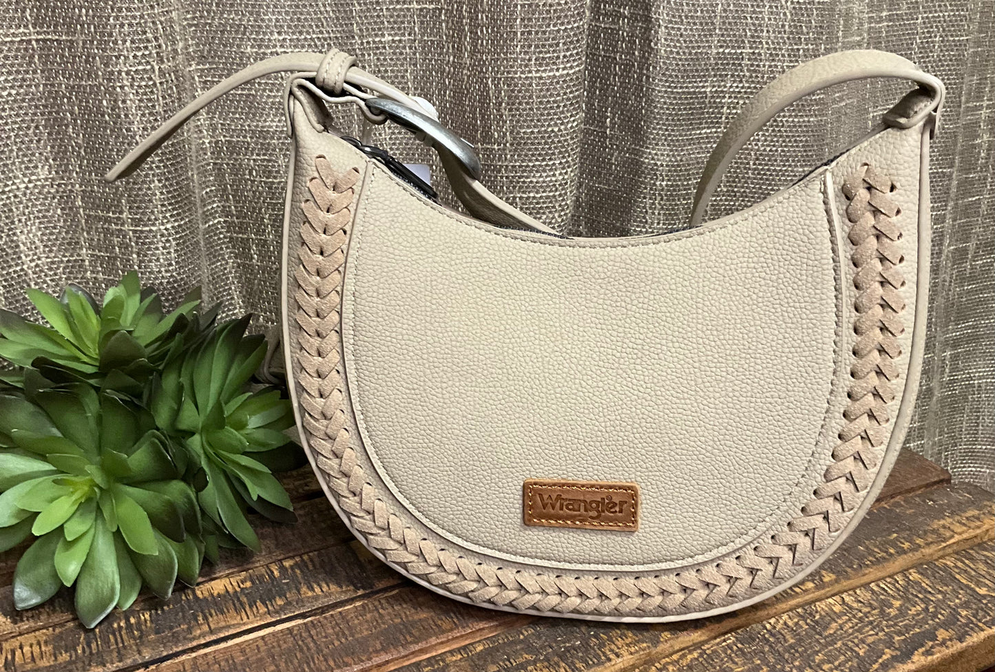 Okalla Shoulder Bag in genuine leather with buckle accent and western-inspired stitching – versatile shoulder or crossbody bag for rustic, elegant style.