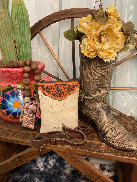 American Darling brand hair-on cowhide crossbody bag with hand tooled genuine leather accent in a floral pattern