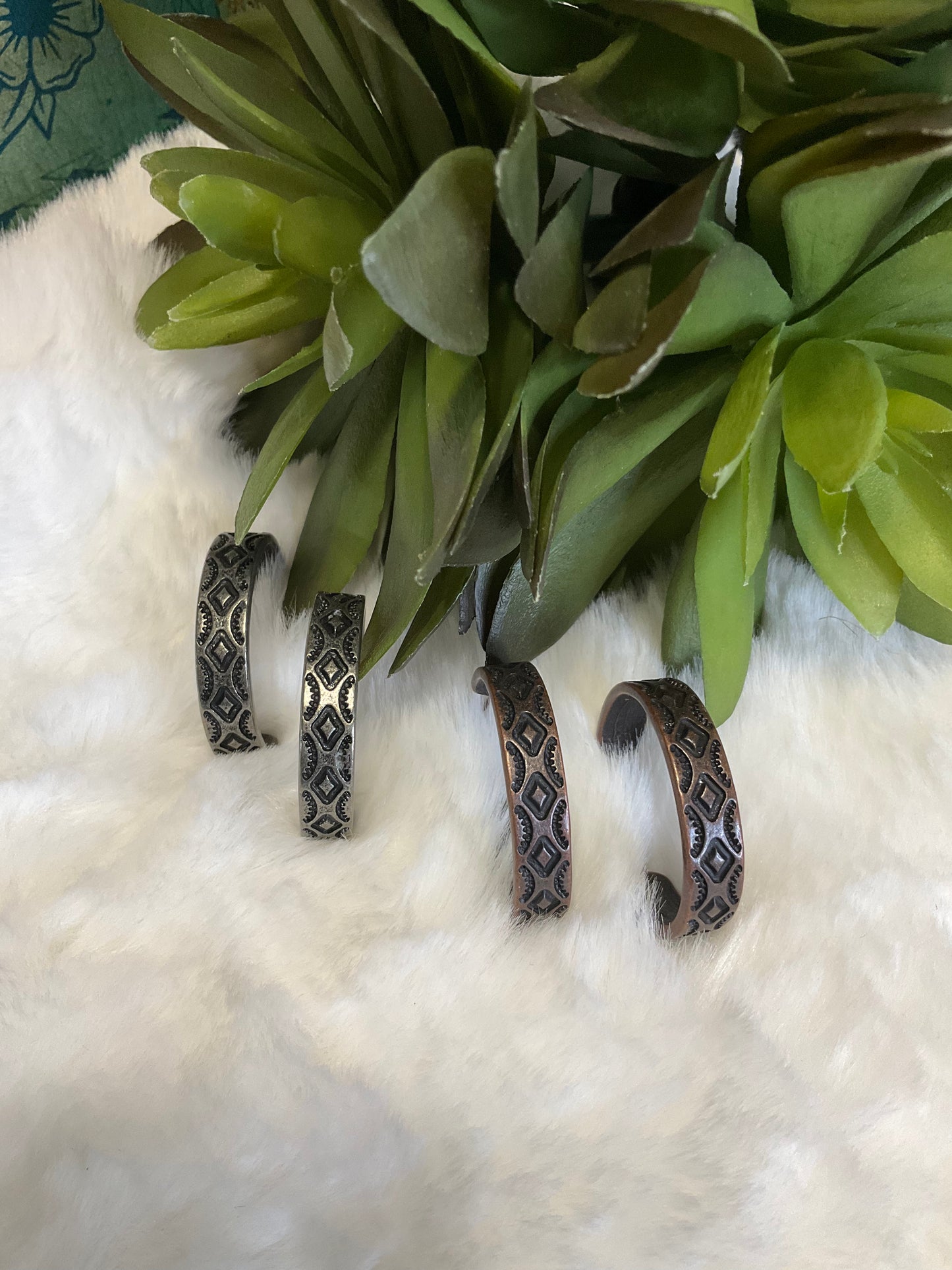 Southwest-inspired Red River Hoop Earrings in faux silver or copper with intricate design, 1.25-inch diameter.