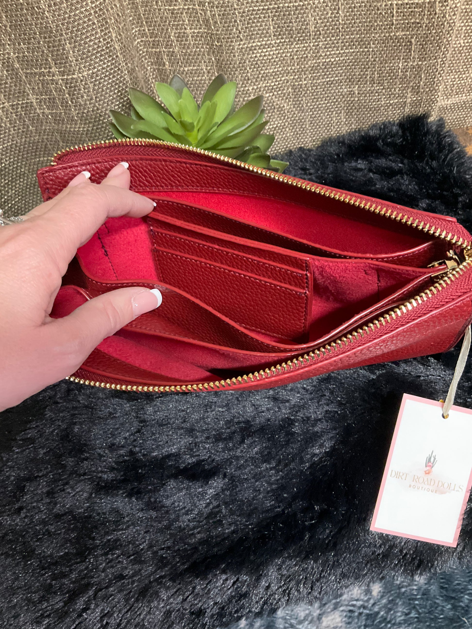 Balcones Heights Convertible Bag in soft pebbled faux leather with zippered closure and five compartments – versatile clutch, wristlet, or crossbody for organized everyday style.