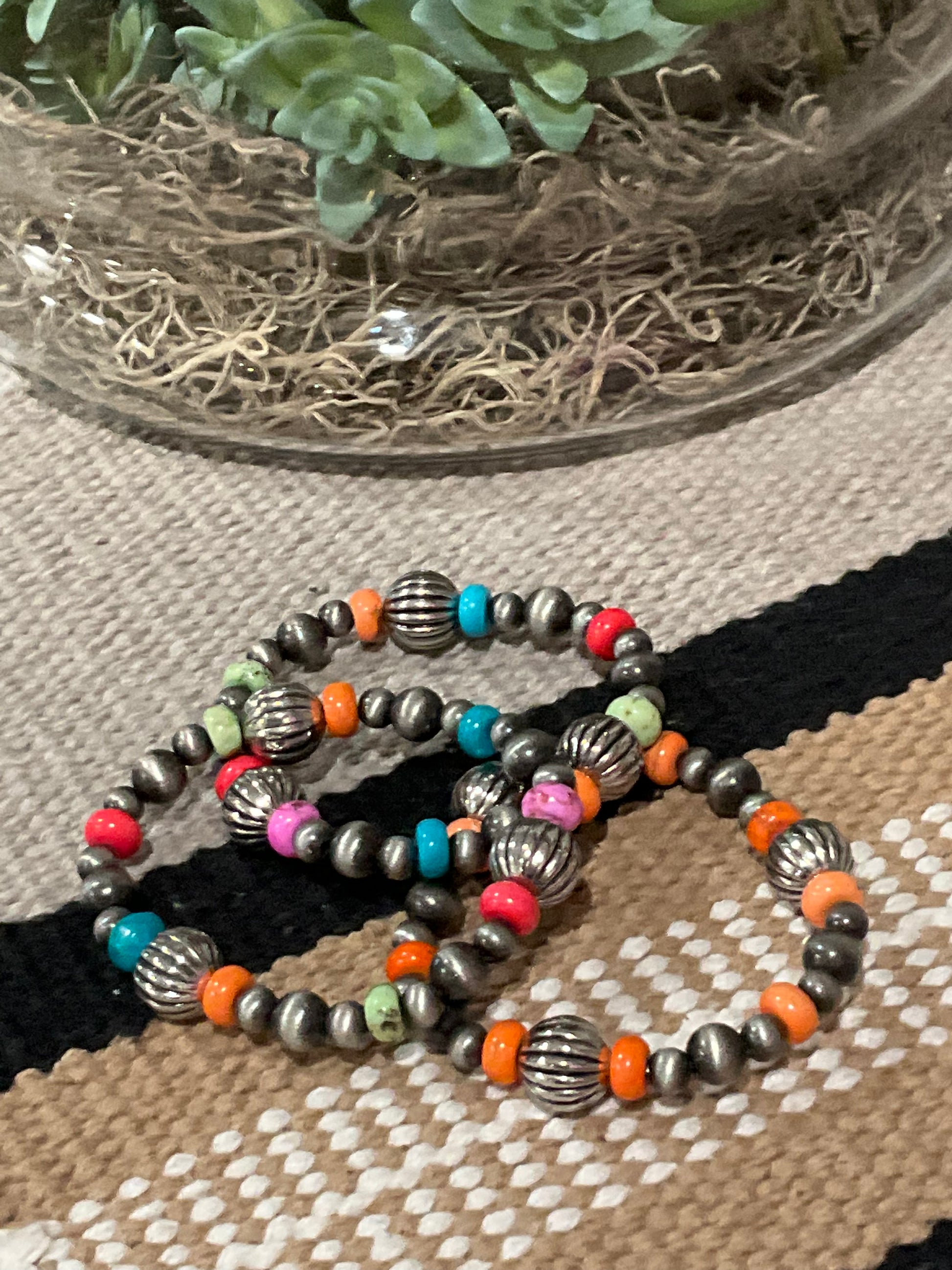 Sonora Sunrise Bracelet featuring vibrant, multi-colored beads in warm earthy tones, perfect for adding a pop of color to your stackable bracelet collection.