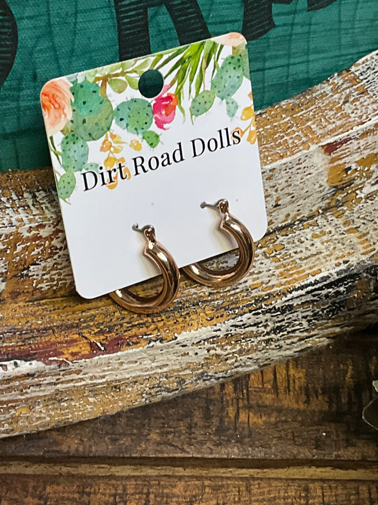 Rose gold-toned 3/4" tube hoop earrings with a lightweight design