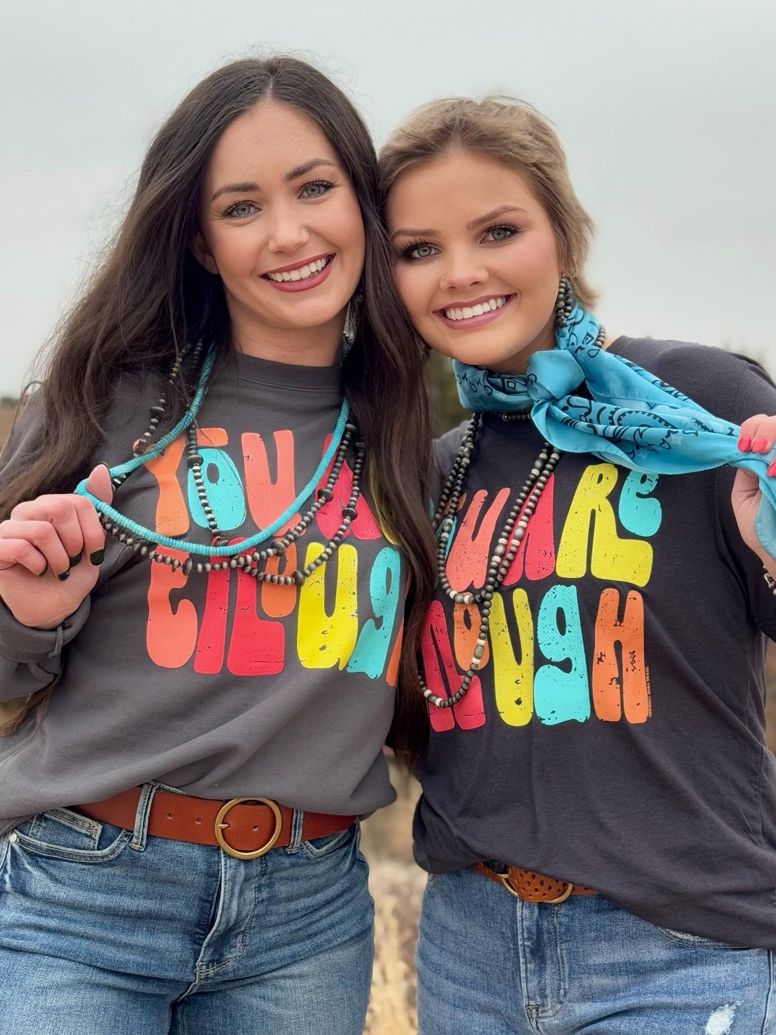 Dark grey Bella Canvas short sleeve tee with a colorful “You Are Enough” design in multicolored ink. The soft, breathable fabric and classic fit make it a versatile and empowering piece.