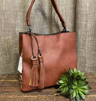 Boutique tote purse with braided handle detail and bold leopard side panels
