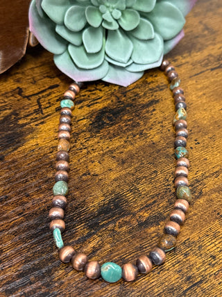     Copper pearl necklace with genuine turquoise accents in a lightweight strand design