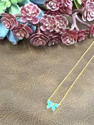 Kingman turquoise bow necklace on gold plated sterling silver chain, feminine western boutique jewelry