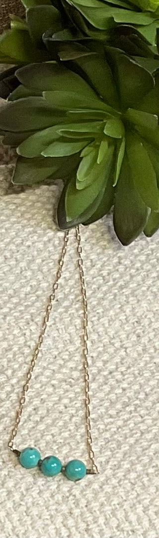 Cripple Creek turquoise necklace with large beads on bronze chain statement jewelry