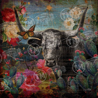 Western home decor featuring longhorn artwork and colorful desert flowers