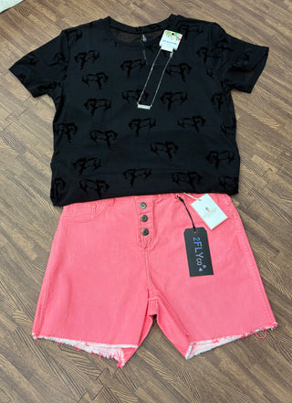 Reversible coral and light pink denim shorts with button-up front, shown styled both ways.