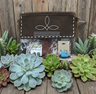 Rodeo Ready Bag Kit featuring 9x11 clear bag with suede boot-stitch top, coordinated wild rag, matching scarf slide, and silver-tone earrings