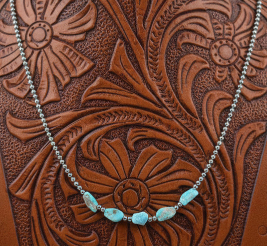 Delicate sterling silver pearl necklace with genuine Golden Hills turquoise stones and extender chain.