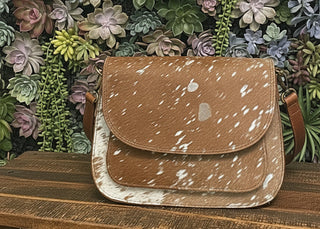 Western crossbody bag with genuine cowhide and silver splatter detailing