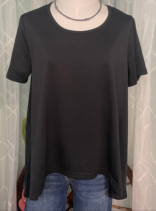 Nicole Top featuring a classic crew neckline and hi-low hem design