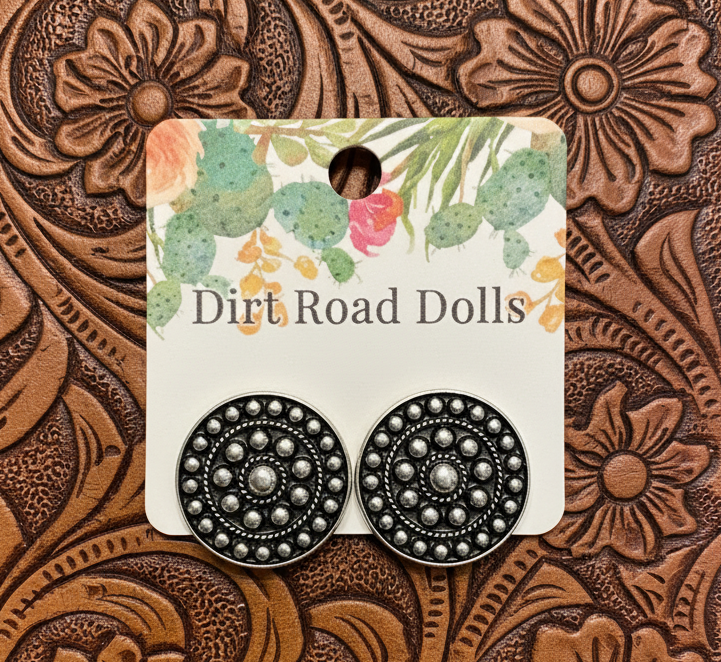 1-inch silver-tone round earrings with concentric bubble-dot rings, lightweight textured western design.