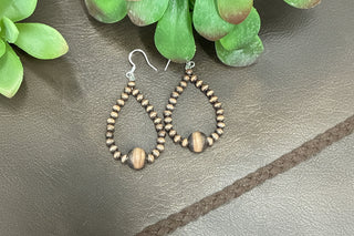     Boutique copper earrings with rustic tones and lightweight comfortable wear