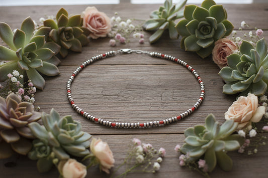 16 inch sterling silver pearl necklace with 3mm round and saucer beads and orange spiny bead accents styled as a timeless western boutique jewelry piece