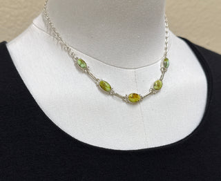 Sterling silver necklace with Palomino turquoise stones in warm green and golden tones, artisan jewelry