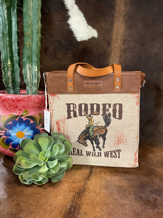 Wrangler Rodeo Tote western style bag with dual handles and adjustable crossbody strap, rugged everyday tote for rodeo, travel, and everyday use from Dirt Road Dolls Boutique