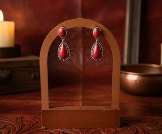 Red Western teardrop stone earrings with antique silver detailing