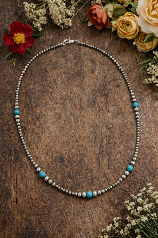 20 inch sterling silver pearl necklace with 3mm beads and turquoise stones accented by graduated sterling beads in a western boutique style
