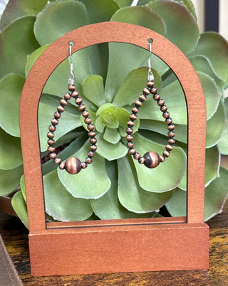     Copper teardrop earrings with graduated copper pearls in a warm rustic finish