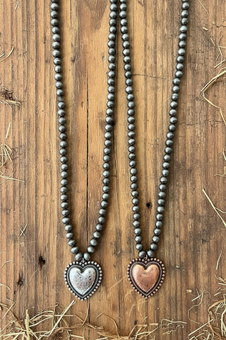 Timeless heart pendant necklace with silver toned or copper toned pearls for everyday western style