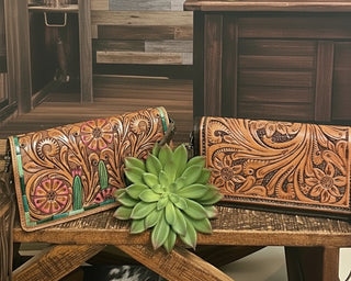 American Darling June genuine leather western wristlet wallet with crossbody strapr, available in a classic design or tooled cactus design with green and pink accents, shown with adjustable crossbody and wristlet straps.