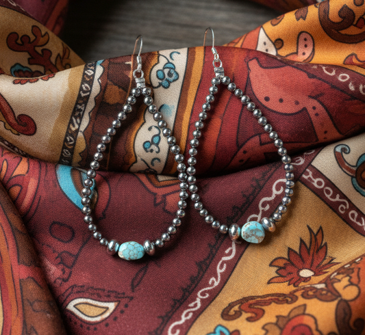  Long sterling silver beaded teardrop earrings with Golden Hills turquoise stone center and French hook backs