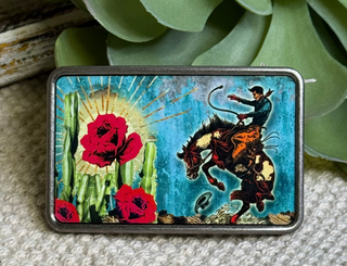 Western belt buckle with bronc rider cactus and rose colorful cowboy design