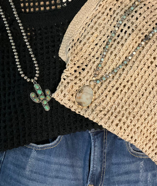 Women’s open crochet sweater top with short sleeves, regular length, and lightweight layering design available in khaki or black