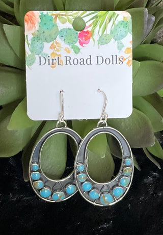 Western sterling silver turquoise dangle earrings in elongated oval design with French hook closure