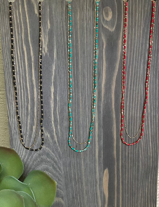 double strand gold necklace with colored beads